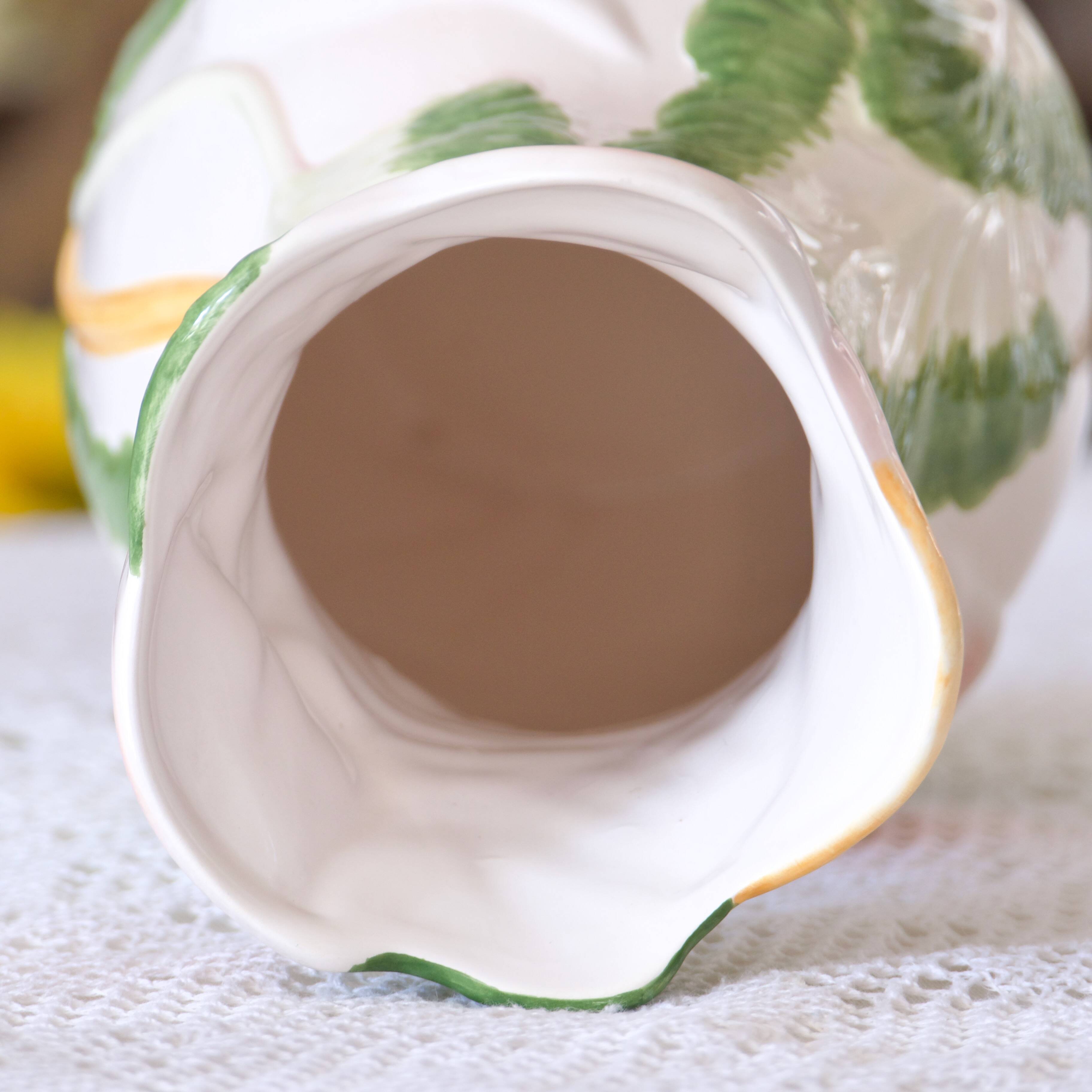 Large slip vase of Arum flowers