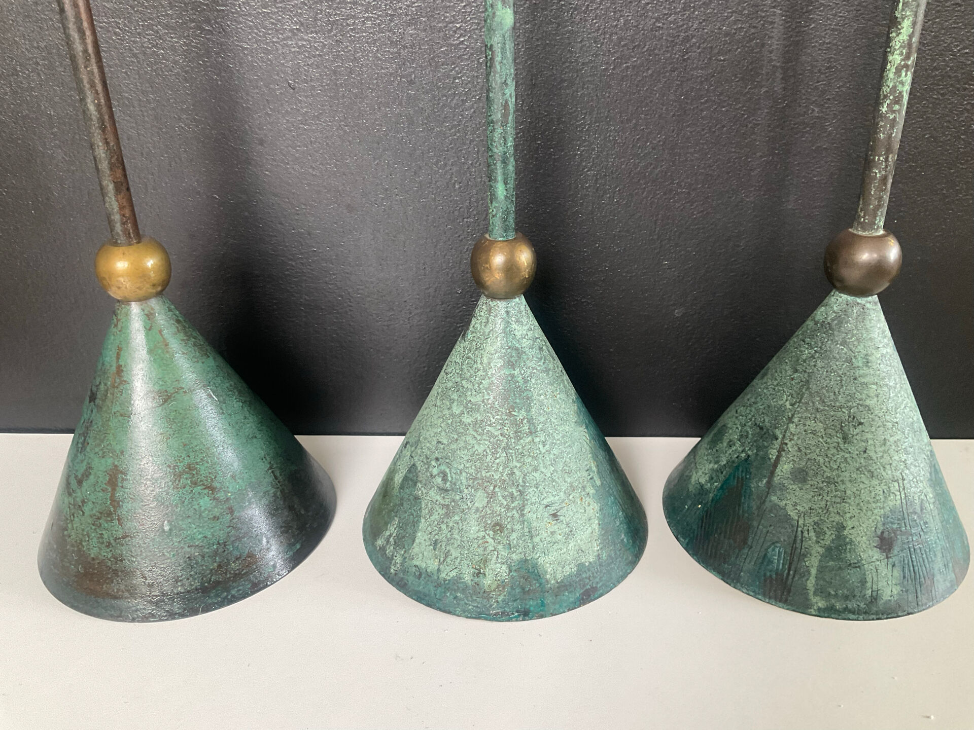 Postmodern metal candlestick trio