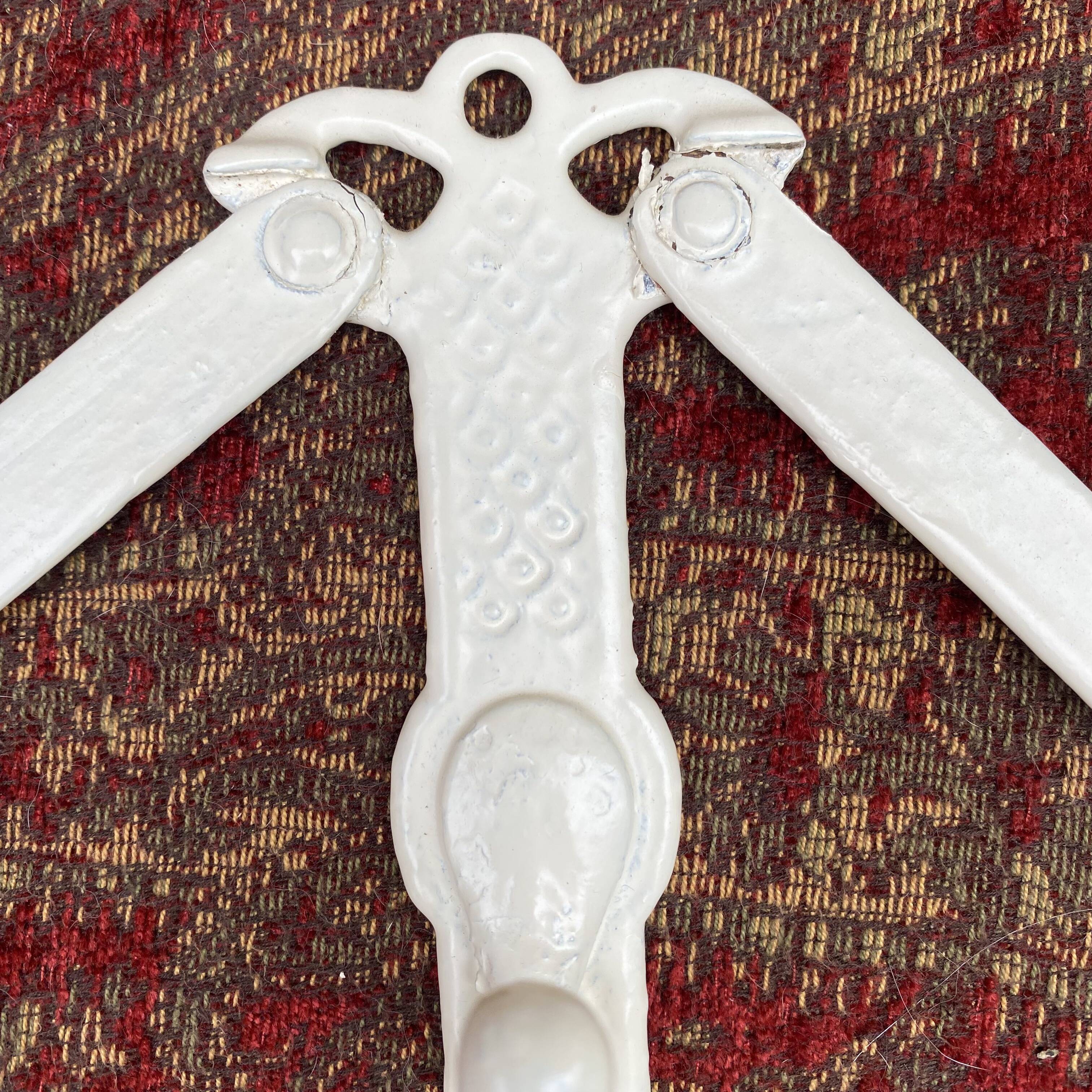 Antique wall-mounted coat rack