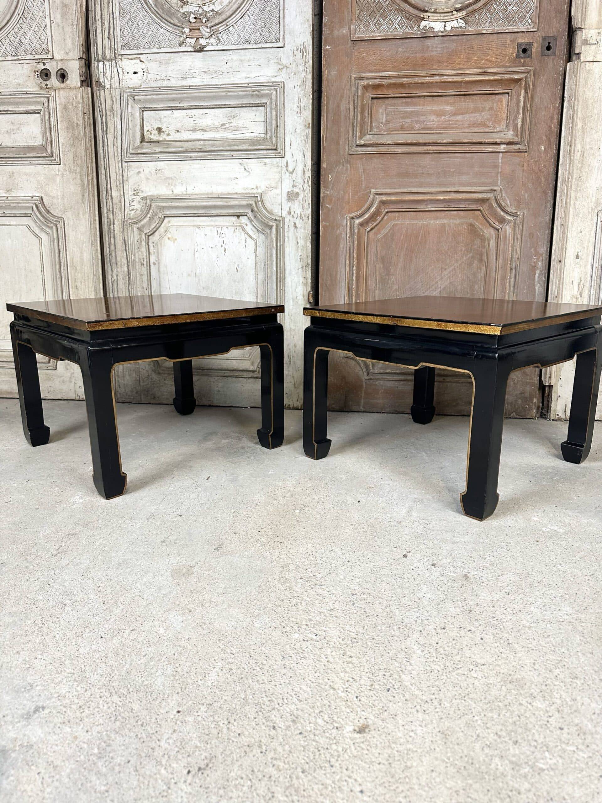 Pair of side tables in black and gold lacquer