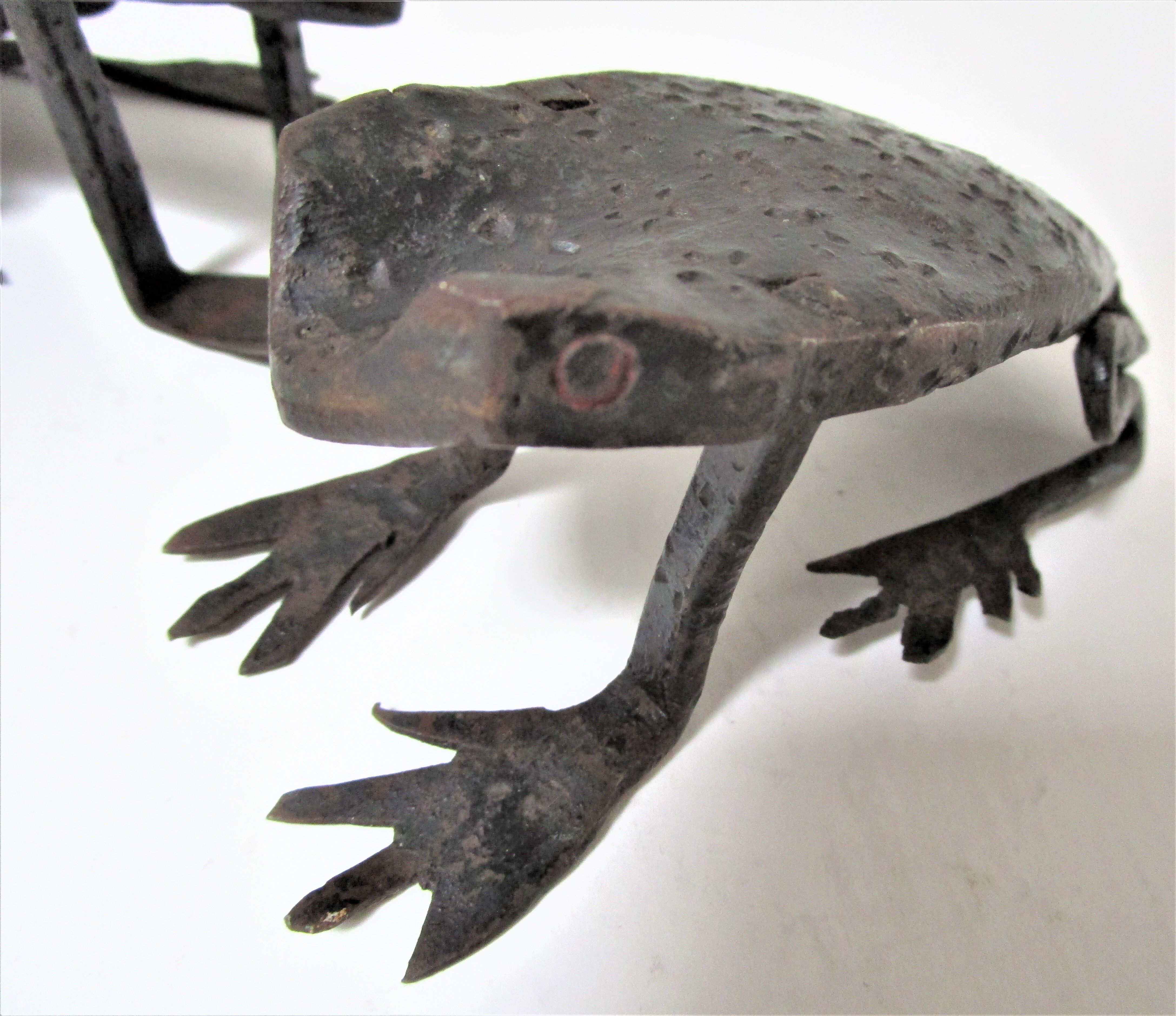 Two metal clipboard frogs patinated vintage brutalist