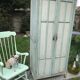 Armoire parisienne verte à panneaux vintage 1940/1950