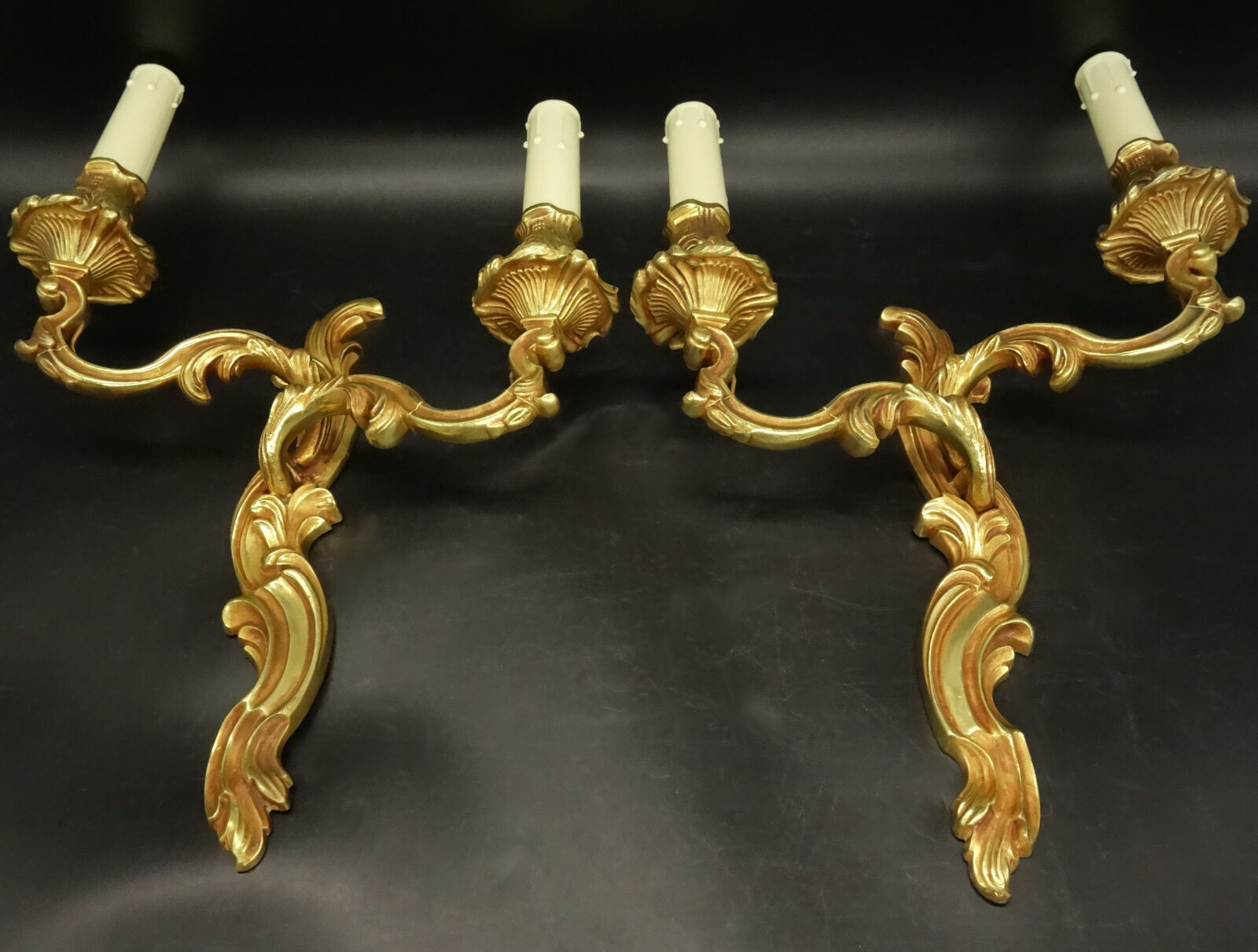 Pair of wall lamps stamped Louis XV style