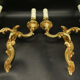 Pair of wall lamps stamped Louis XV style