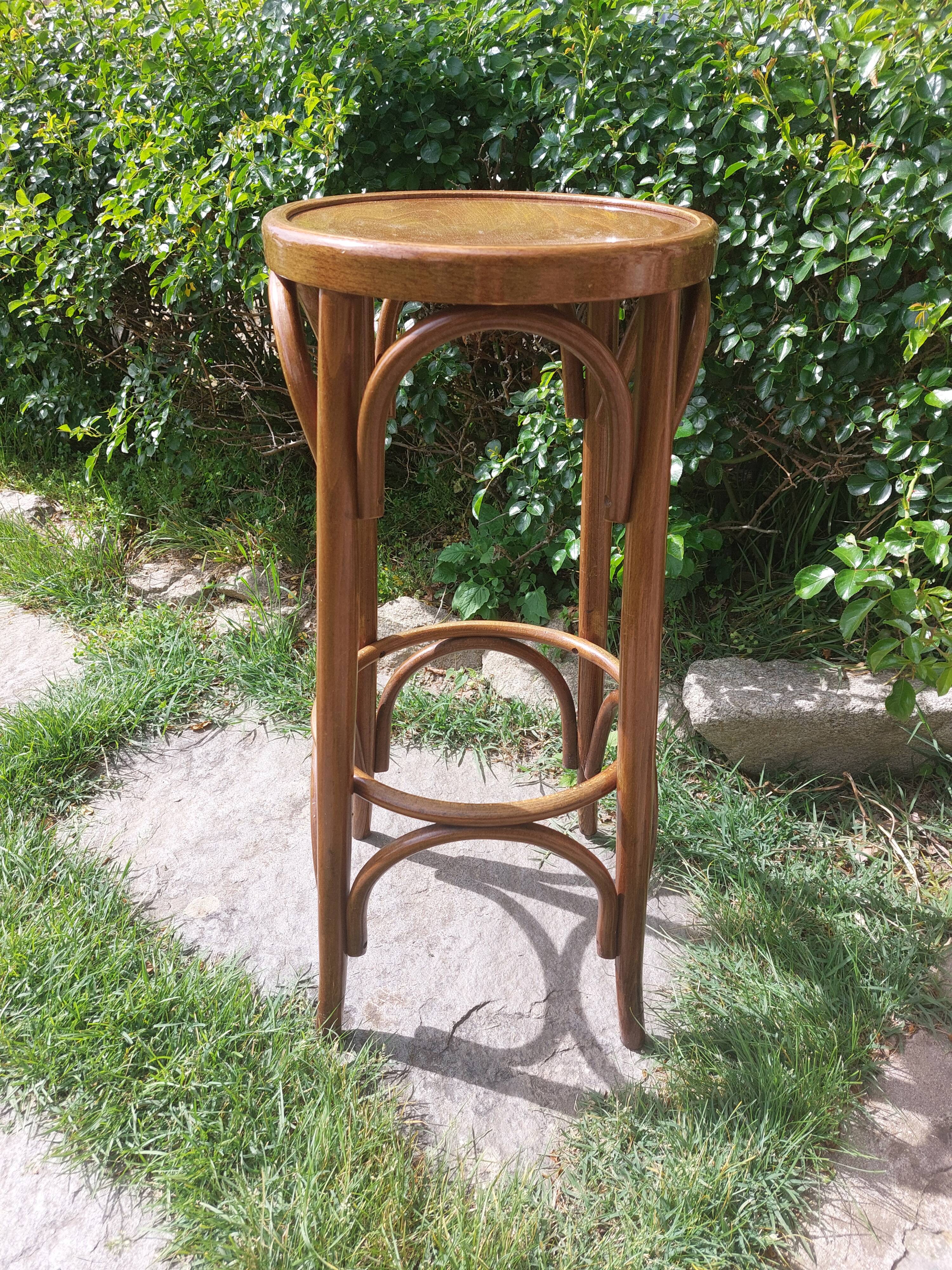 curved wooden bar stool