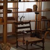 A pair of modern and sculptural vintage Danish armchairs in oak and papercord, 1940s.