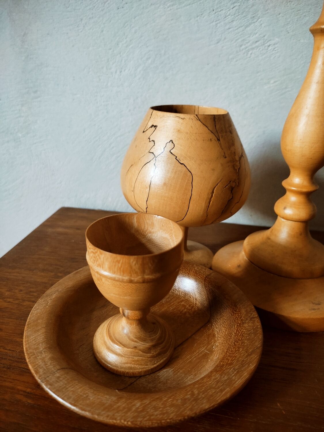 Composition of vases and cups in turned wood