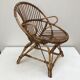 Fauteuil en rotin forme coquille