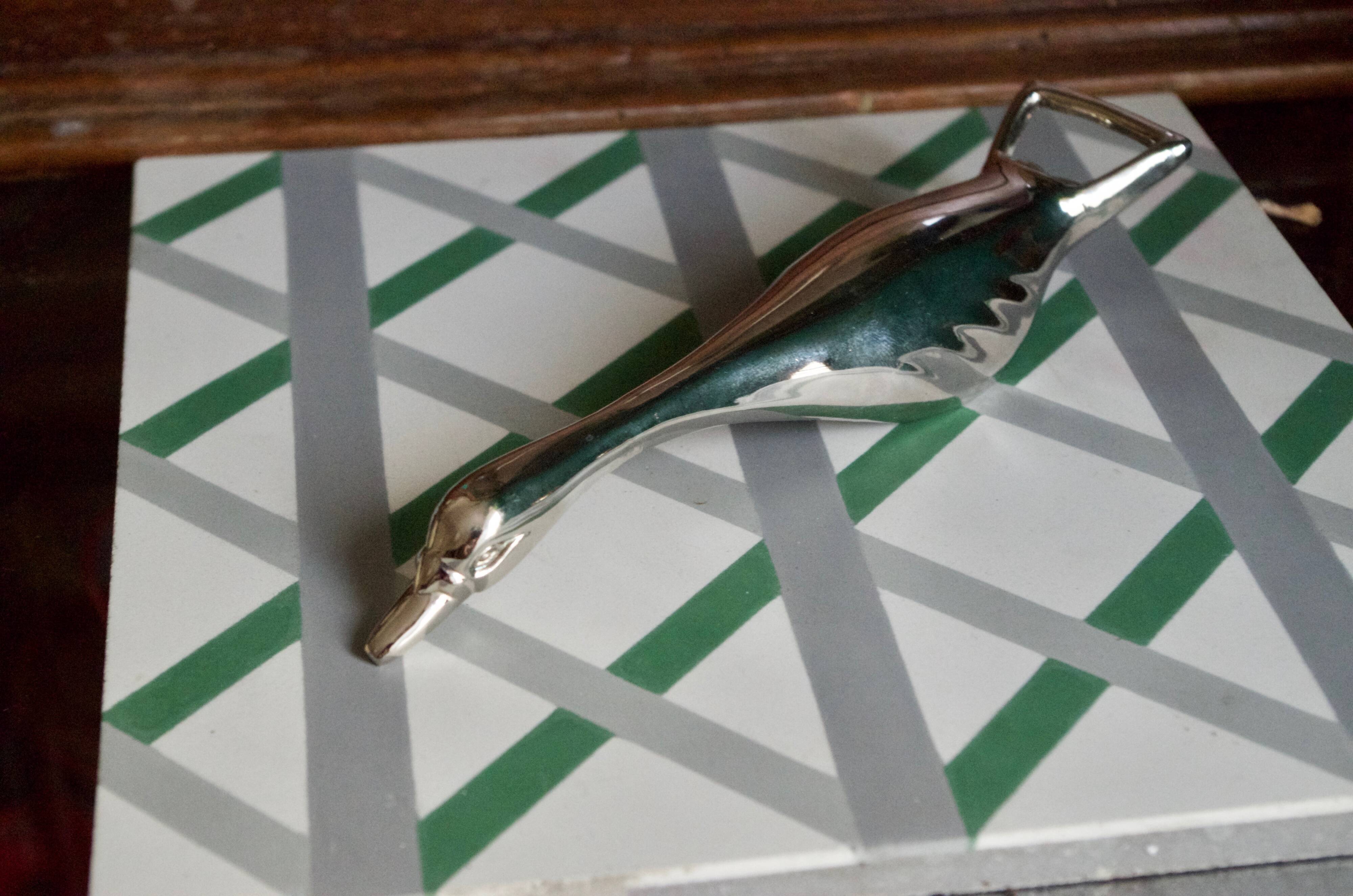 Vintage goose in flight bottle opener in silver metal