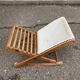 Folding rocking footrest in wood and white leather