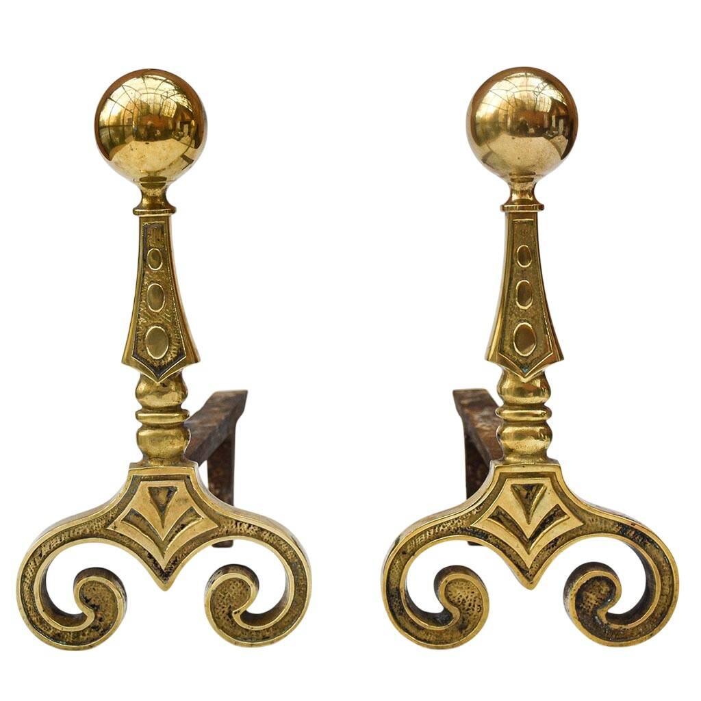 Gilded bronze andirons with rounded ball and patterns, antique fireplace accessory