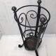 Wrought iron umbrella holder