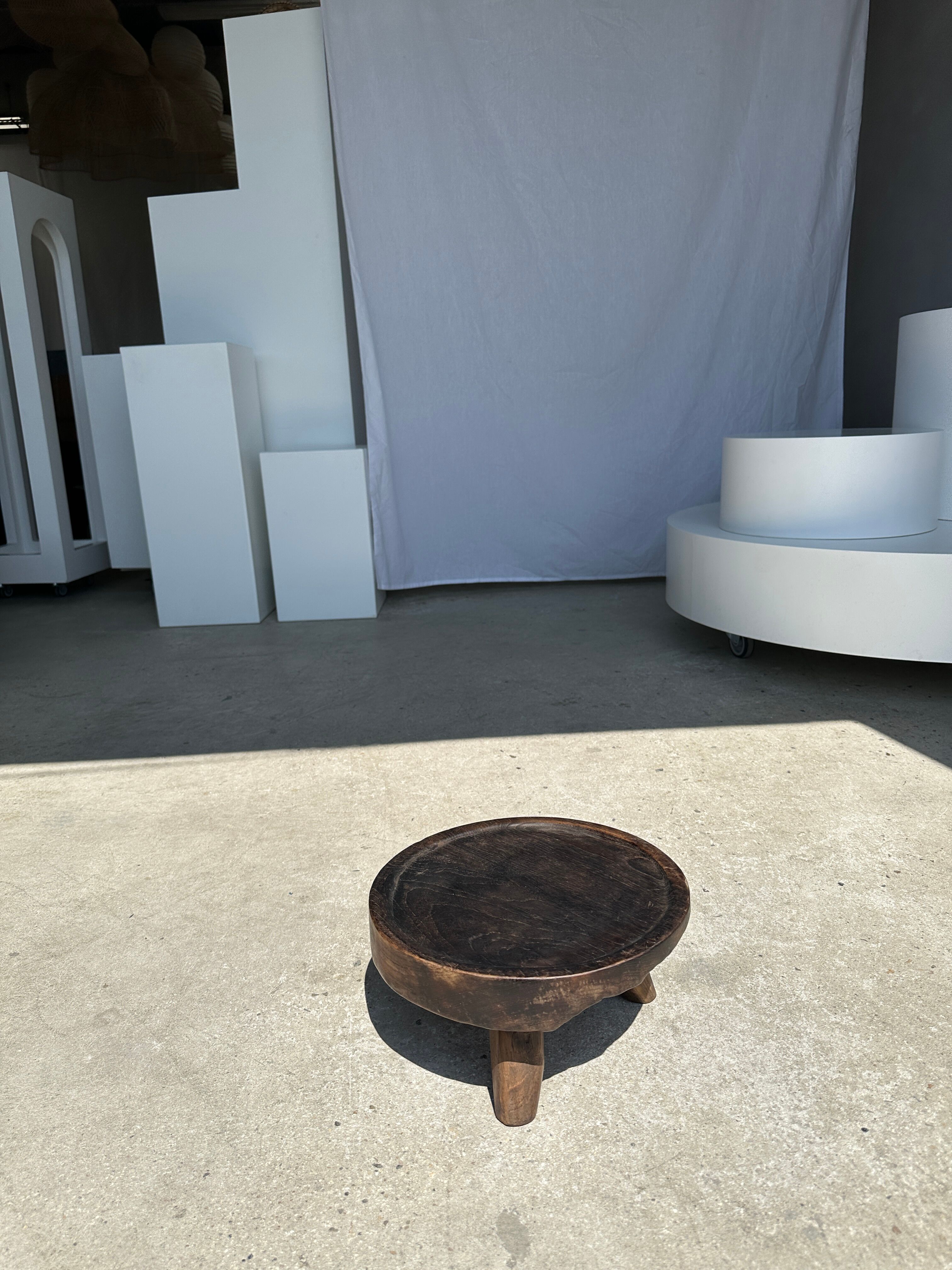 Small tripod stool low in dark brown upcycled teak