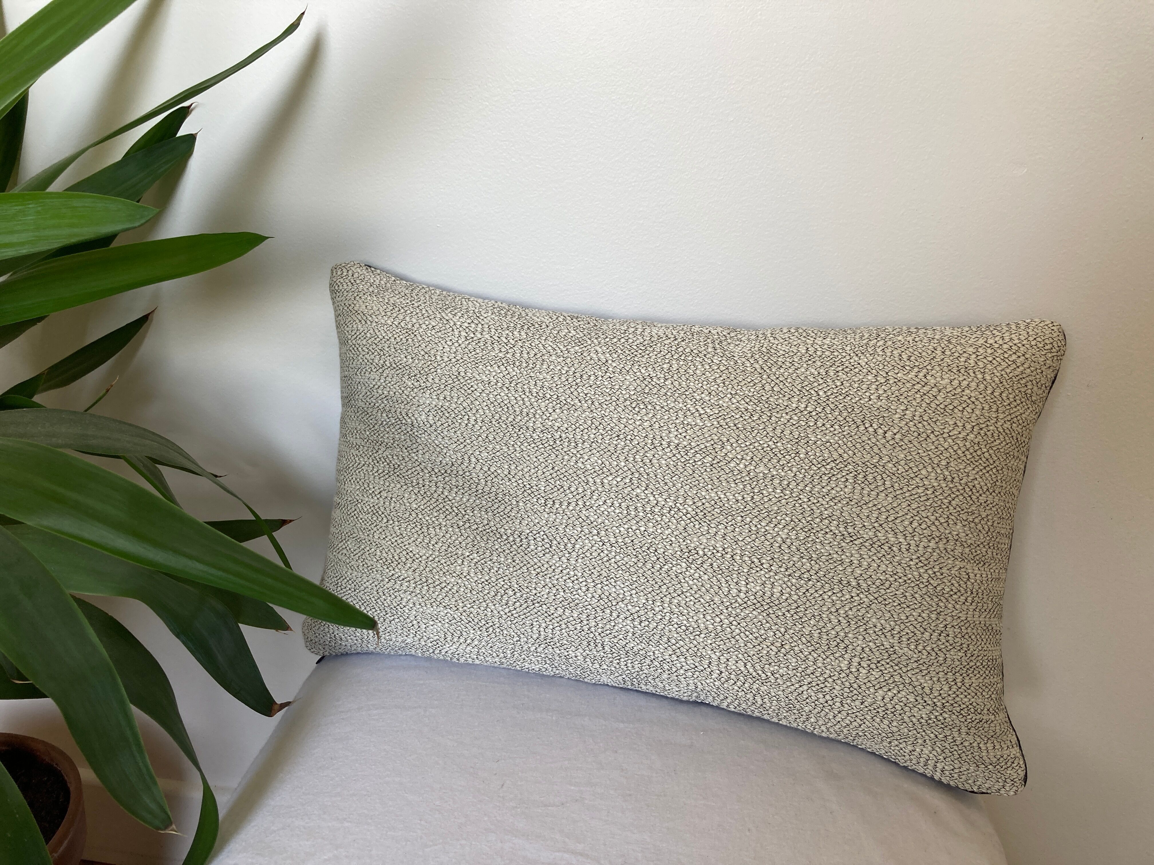 Two-sided cushion braided white black navy blue