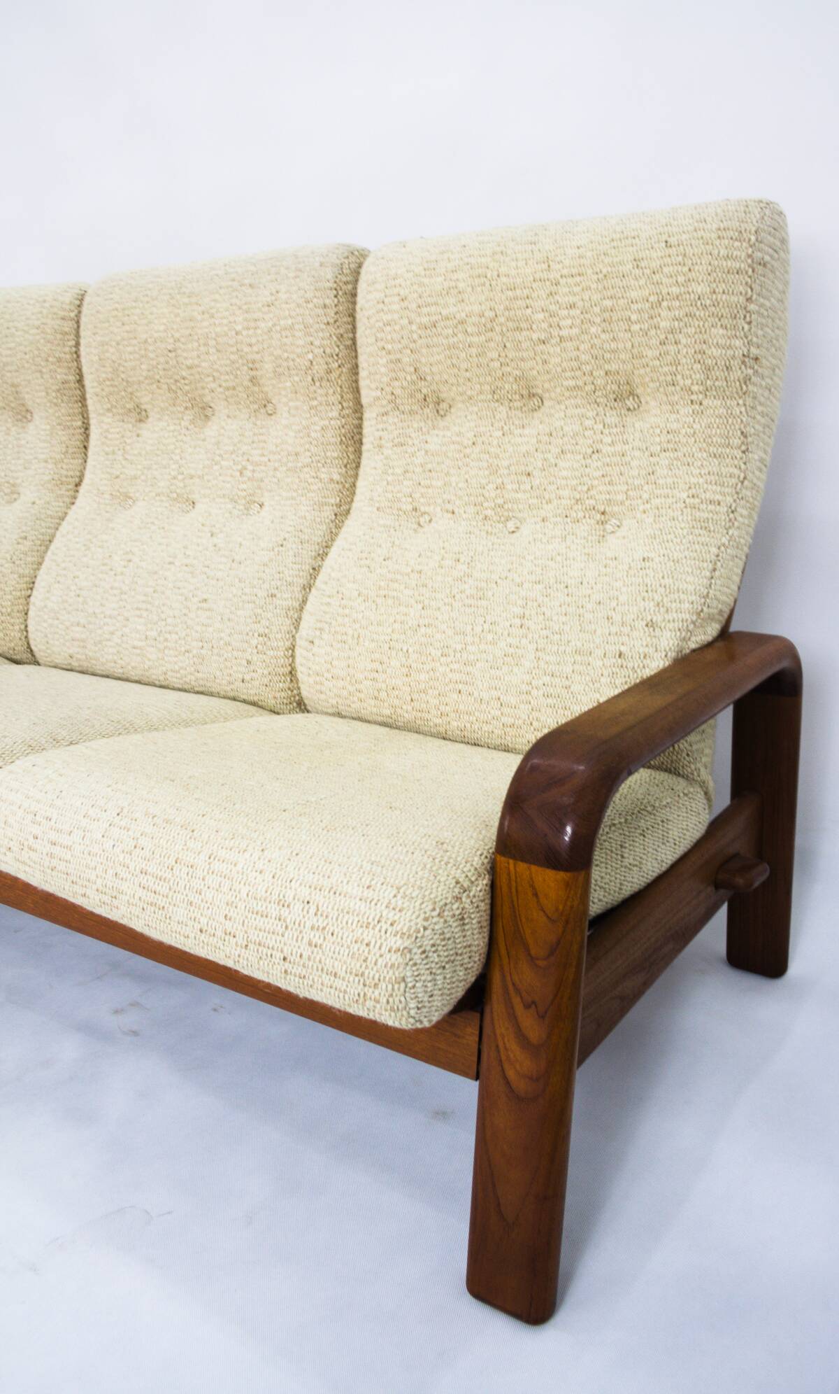 Teak three-seater sofa