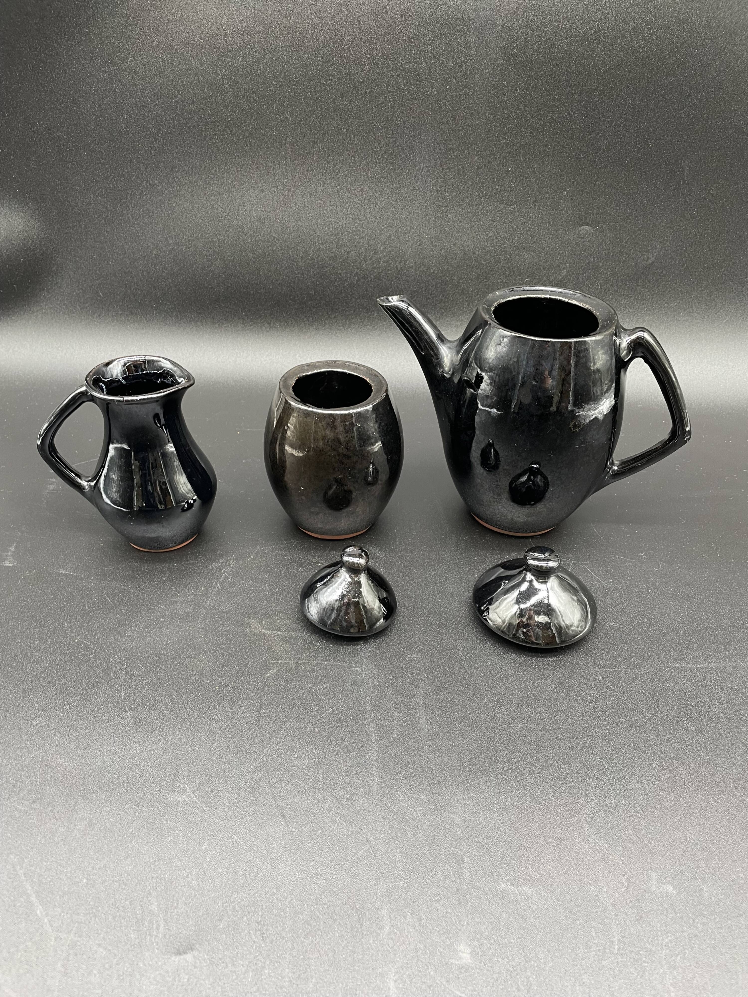 Brutalist black ceramic coffee service – Modernist design