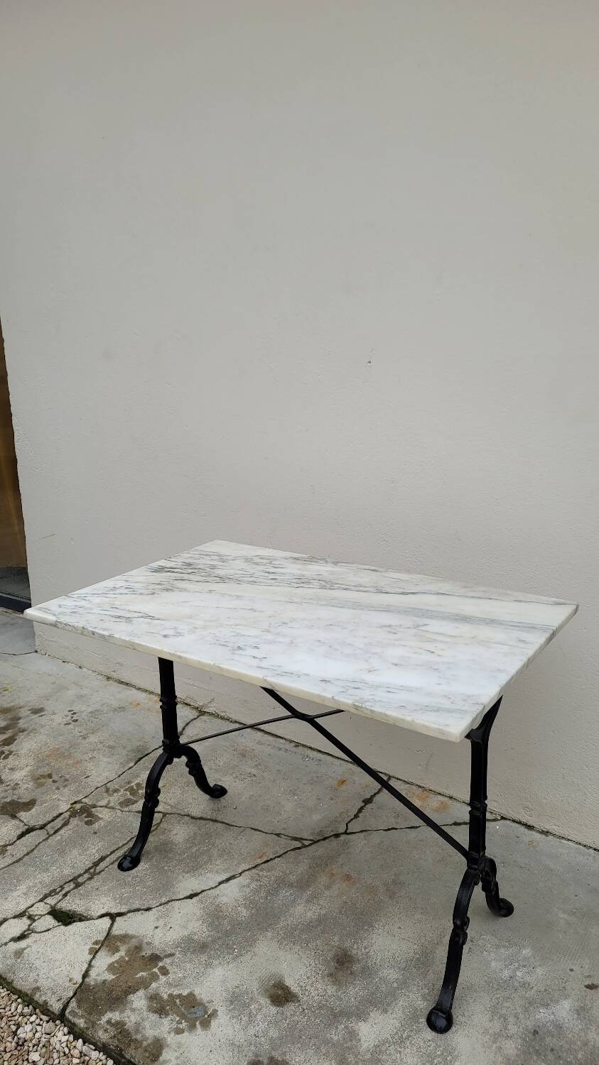 Marble and cast iron restaurant bistro table