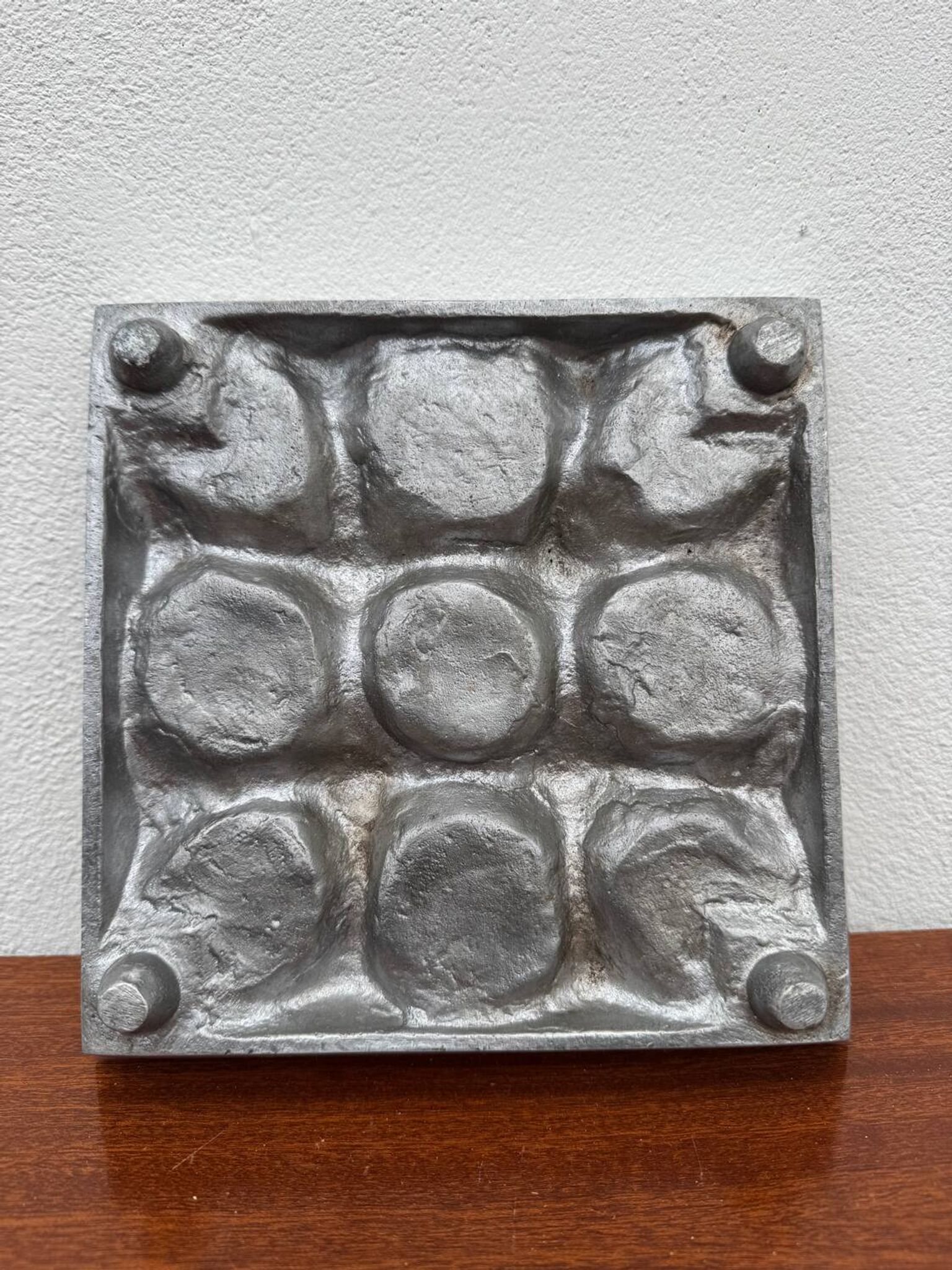Brutalist style brushed aluminum candle holder