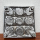 Brutalist style brushed aluminum candle holder