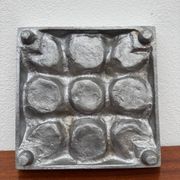 Brutalist style brushed aluminum candle holder