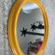 Vintage oval mirror from the 1970s.