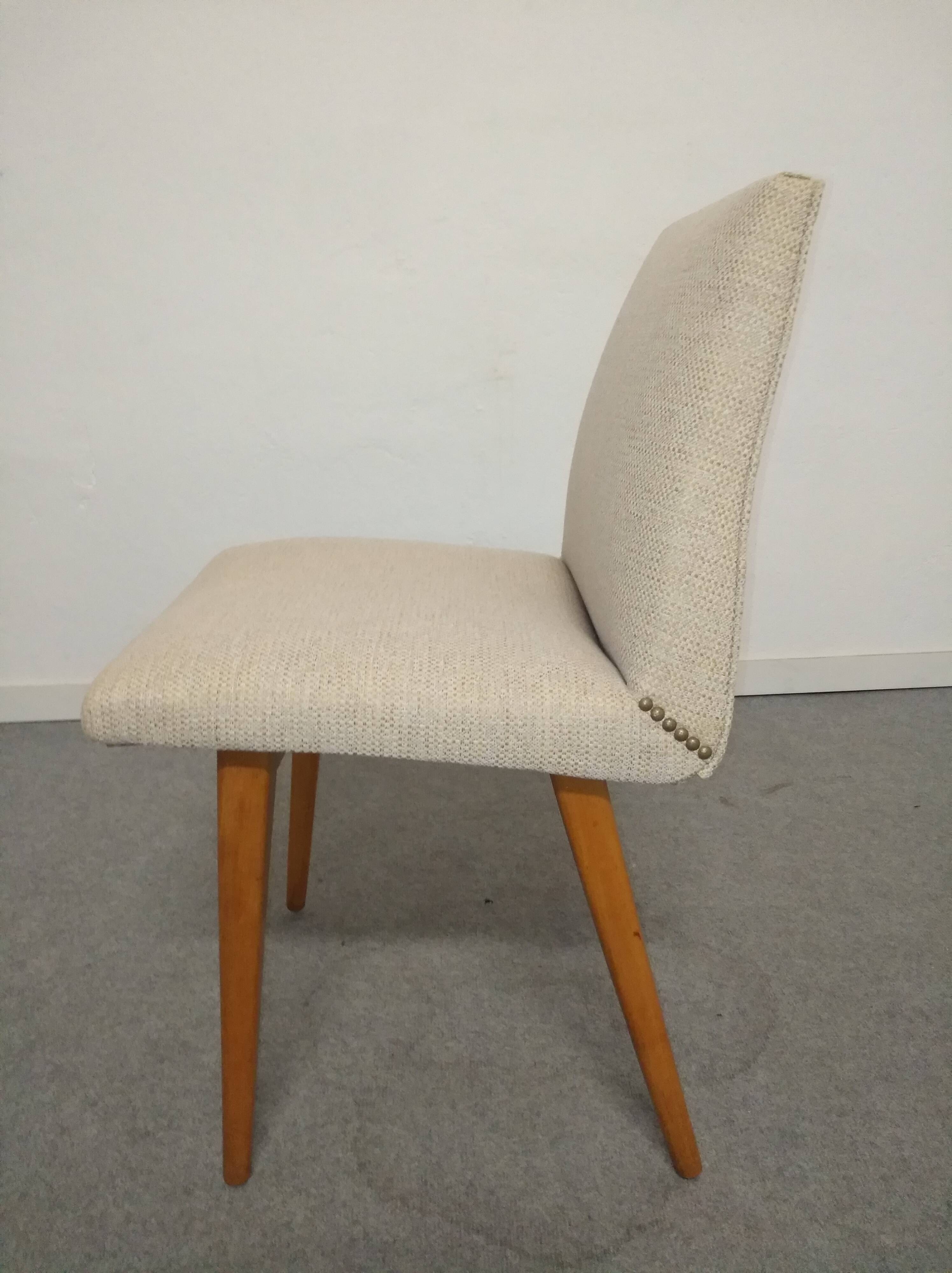 Pair of cocktail chairs in beech, Eastern Europe circa 1960.