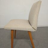 Pair of cocktail chairs in beech, Eastern Europe circa 1960.