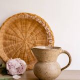 Small pitcher in old speckled stoneware