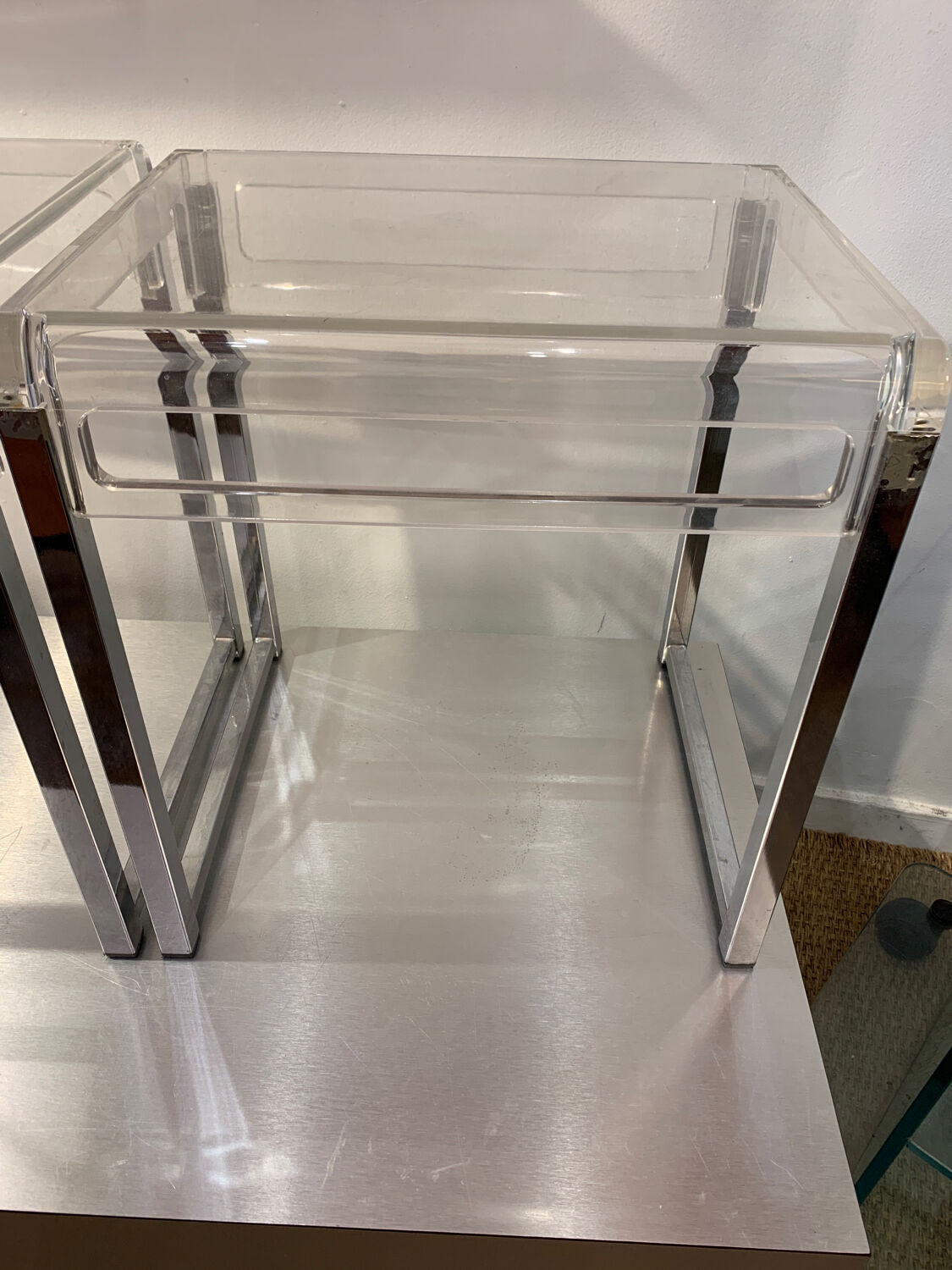 Pair of vintage chrome and acrylic glass bedside tables