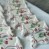 Suite of 18 knife holders in faience of luneville model reverbere