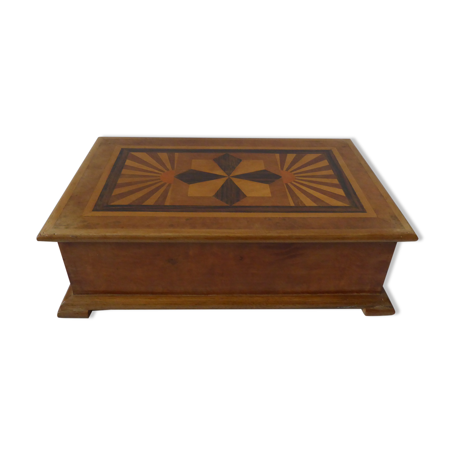 Branded wooden box decorated with suns