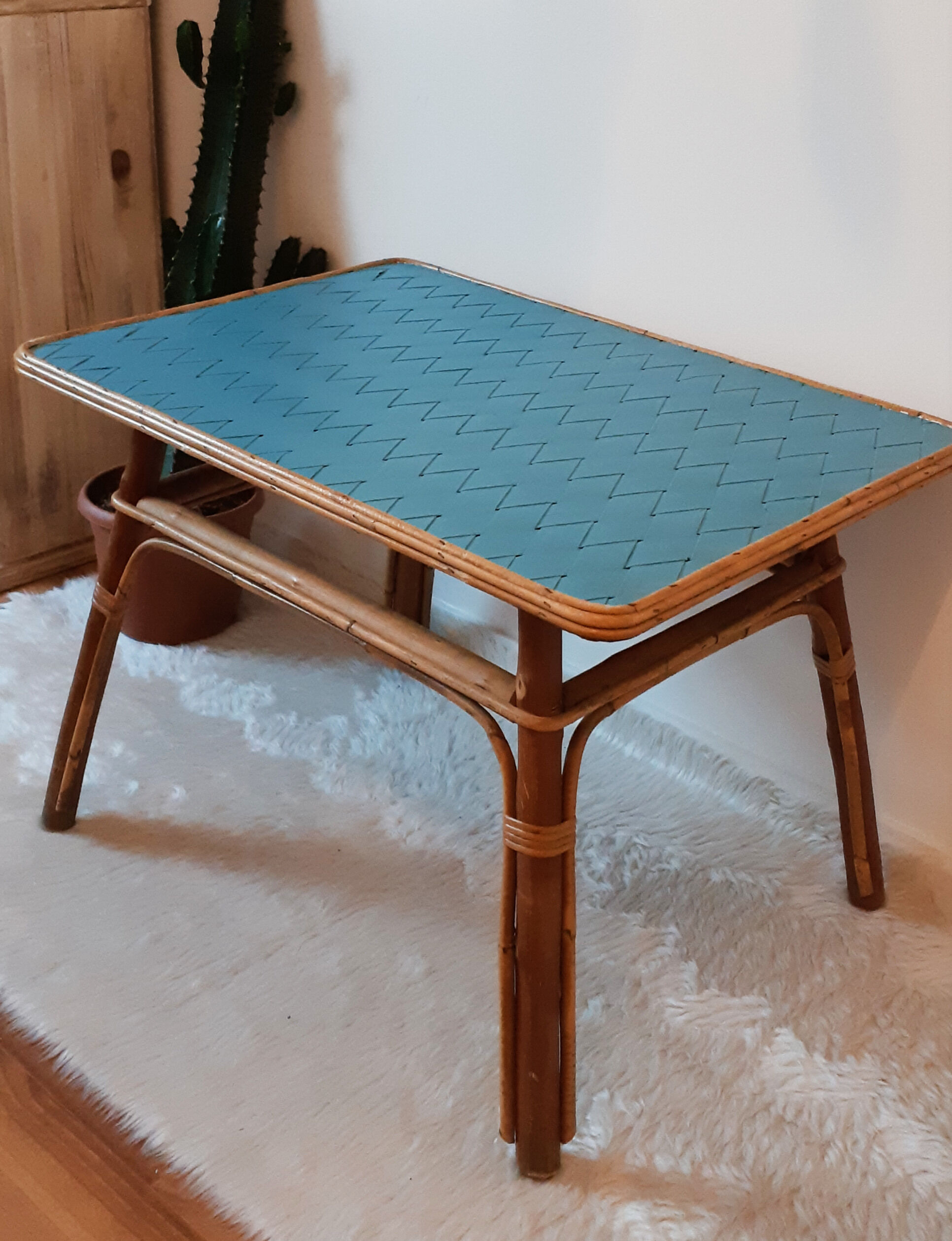 Coffee table in blue rattan