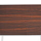 Vintage nesting table in rosewood and high polished metal base.