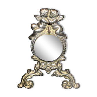 Porte-montre gousset en bronze à décor d'amour angelots