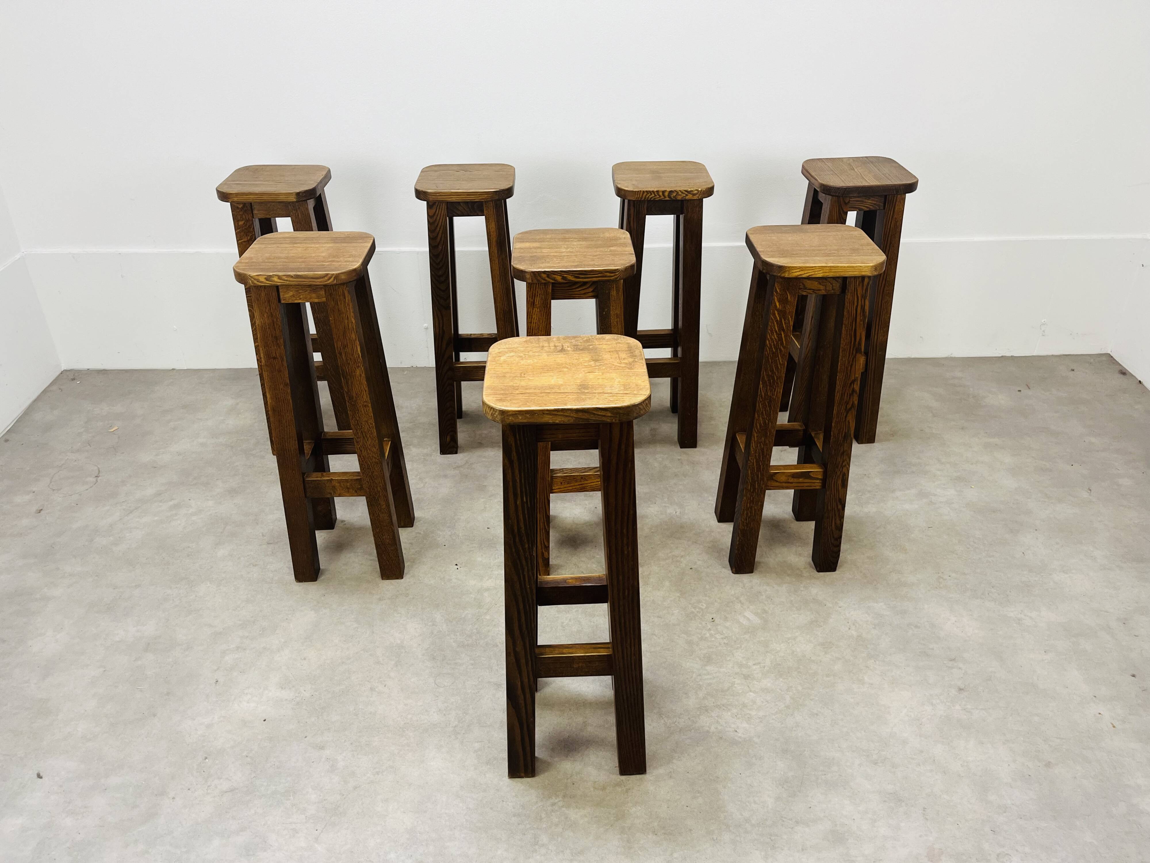 8 solid wood bar stools in brutalist style