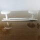 Wall coat rack in white lacquered metal with 2 hooks, 1970.