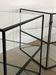 2 tables, black metal contemporary sofa pieces and glasses on 3 levels 60x60x60