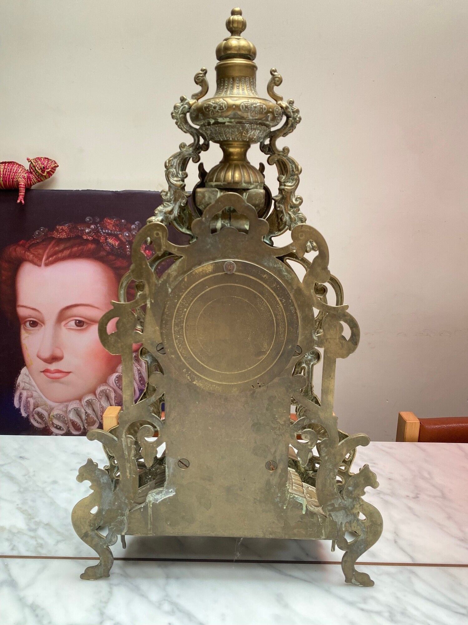 Fireplace trim clock and adornment of antique bronze candelabra
