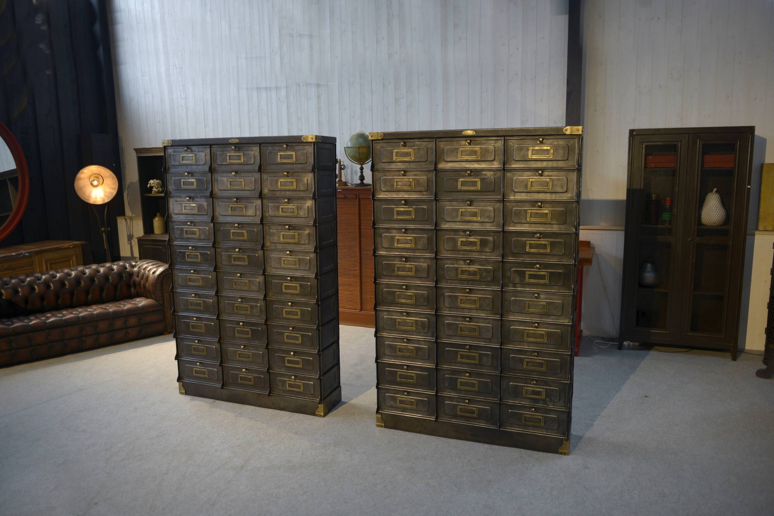 Pair of STRAFOR French cabinets with flaps, circa 1920s