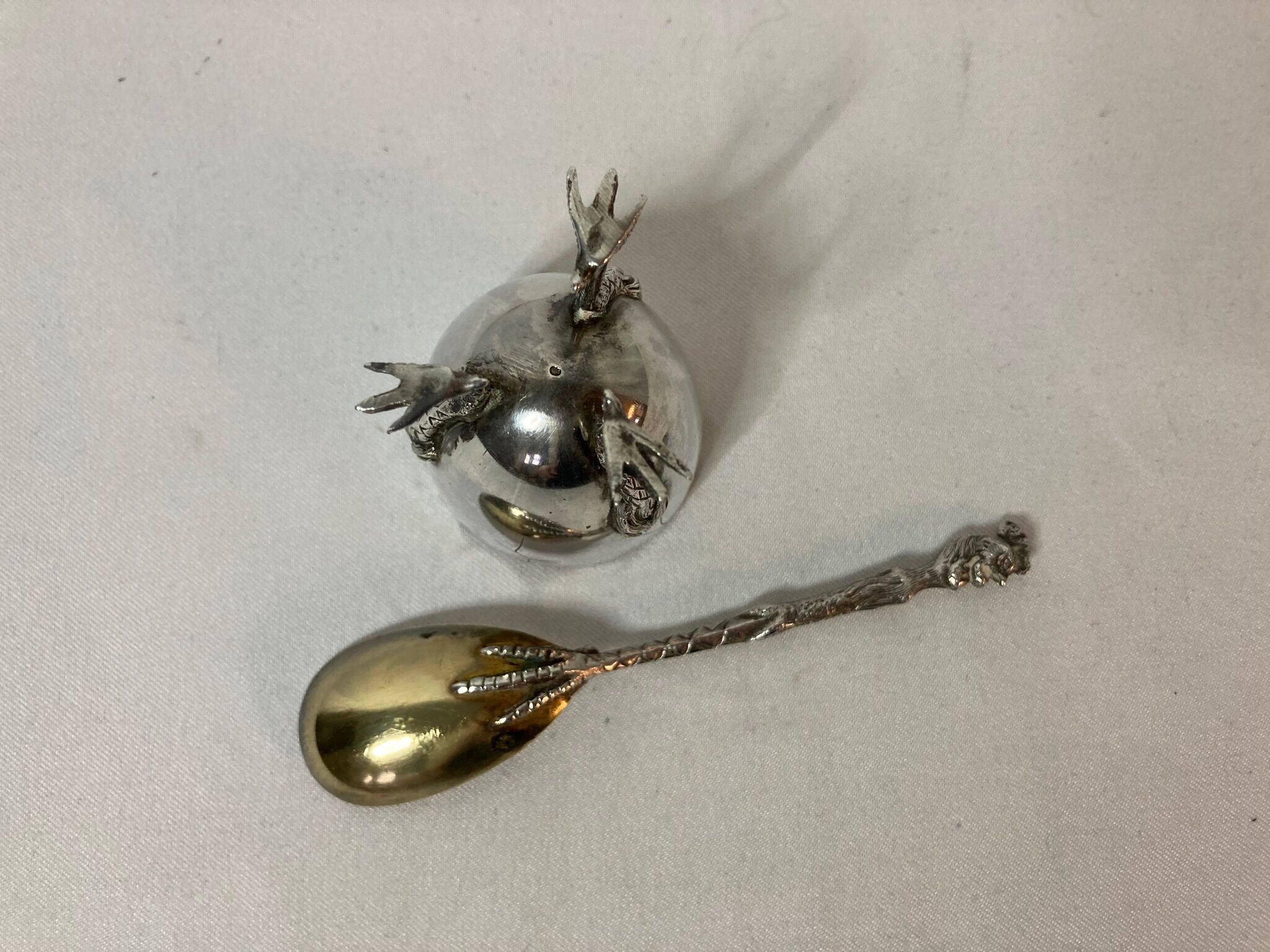 Eggcup feet and silver spoon punches early twentieth century