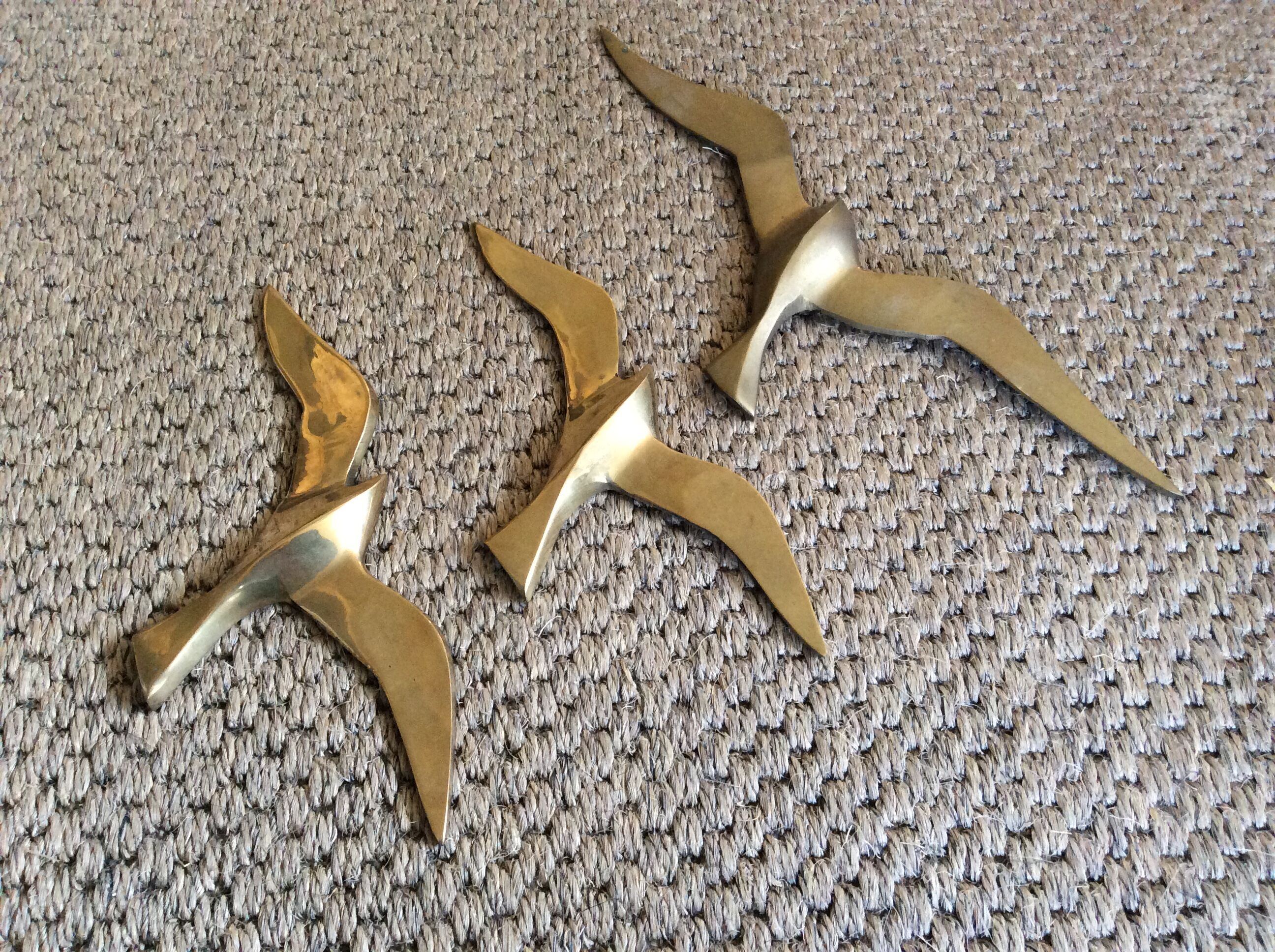 3 brass seagulls