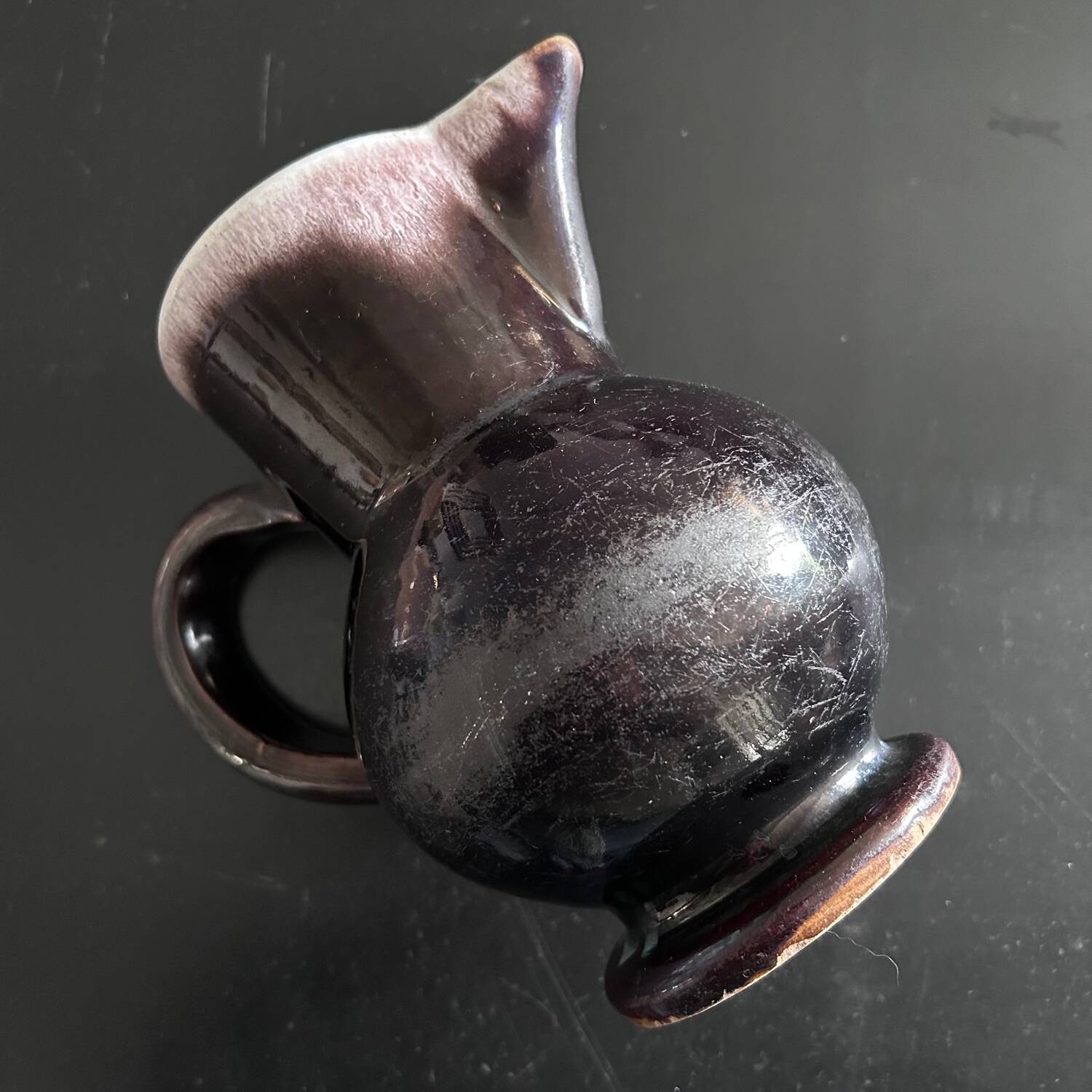 Antique tilted pitcher