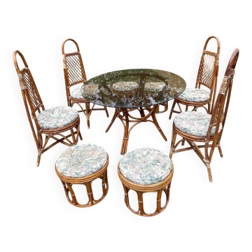 Vintage rattan dining set with glass table, 4 chairs and 4 stools.