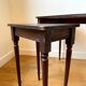 Dark wood and black leather tables