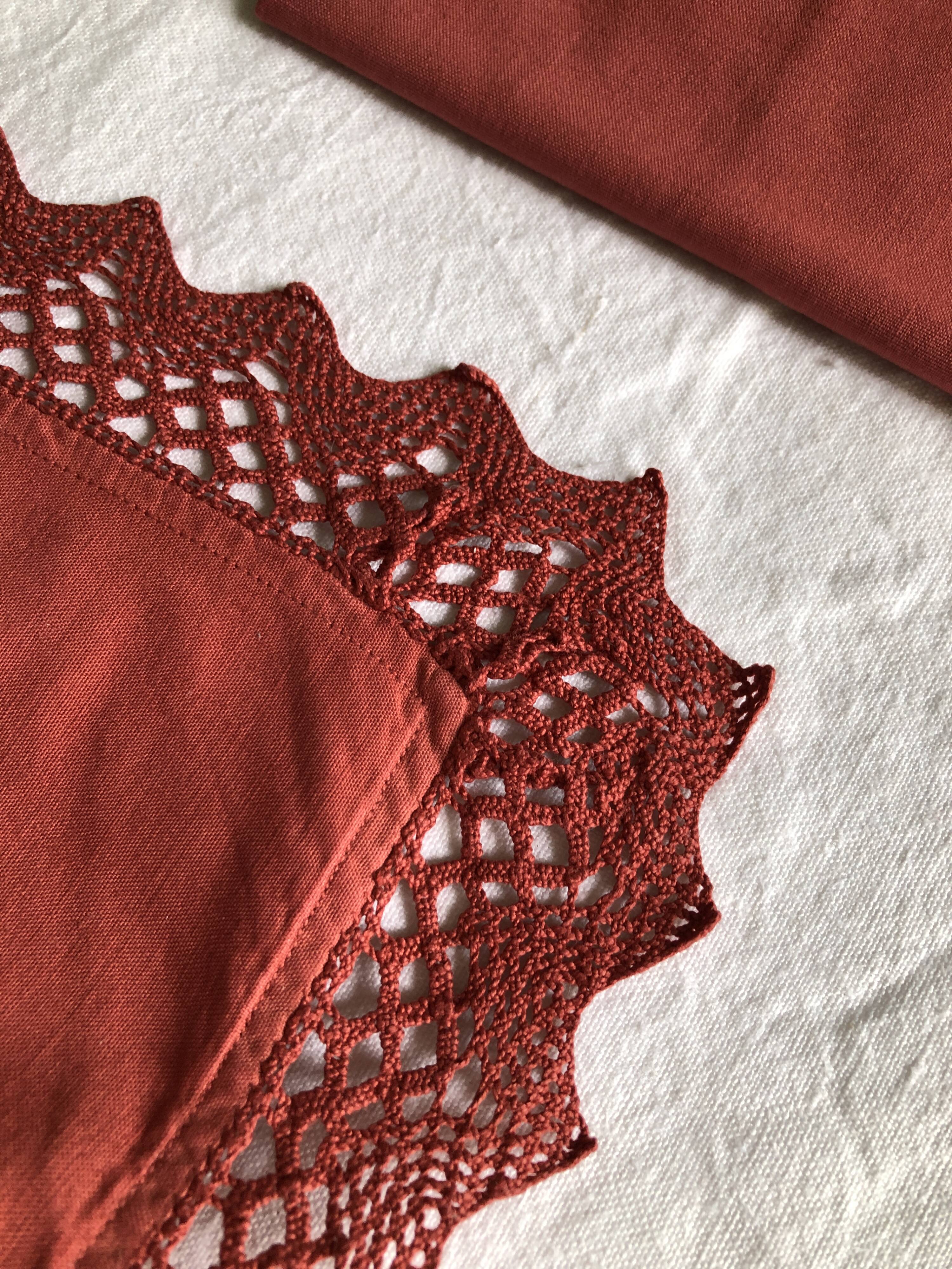 Pair of antique brick red cotton pillowcases