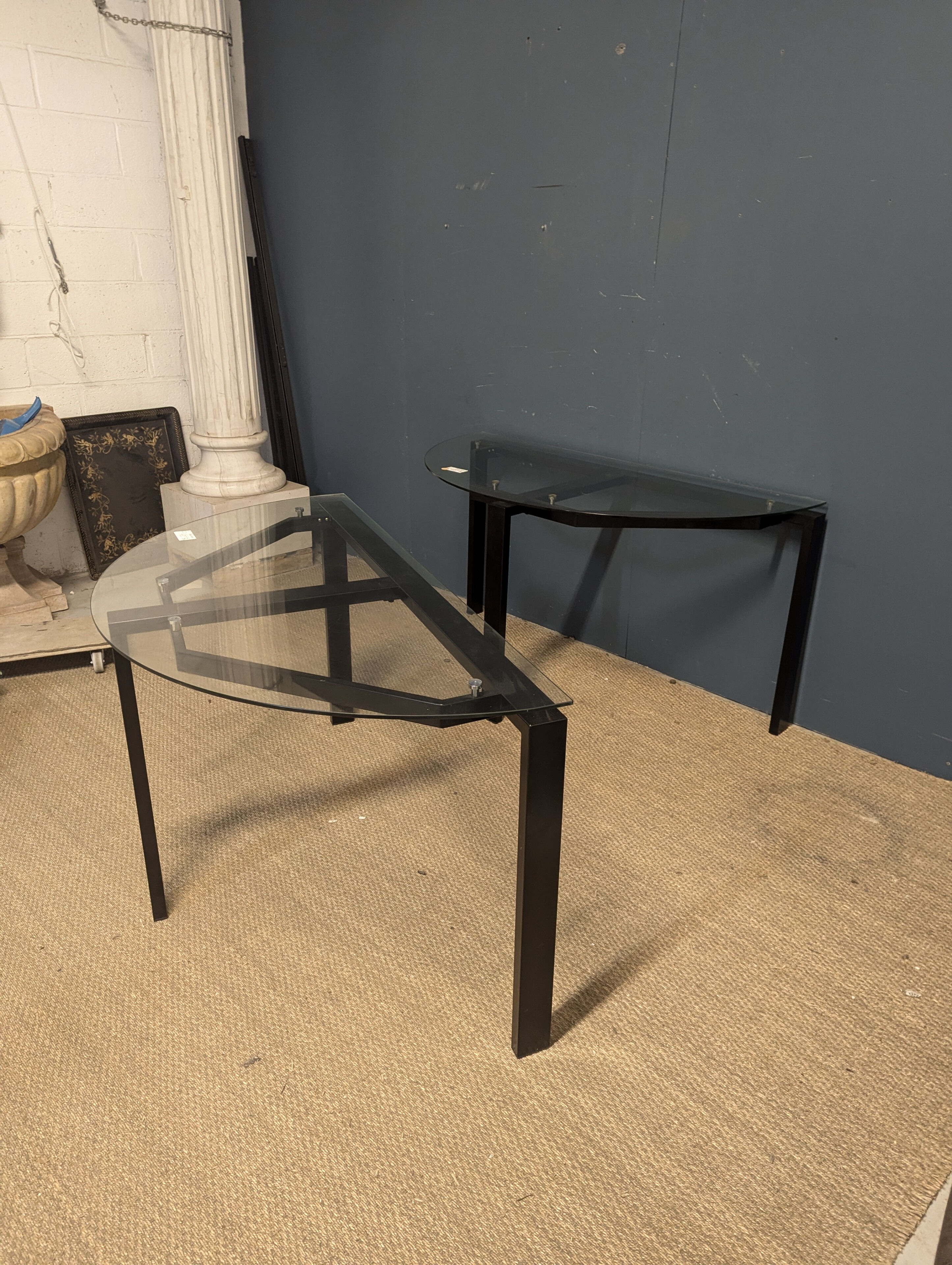 Black metal console with glass top