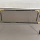 Gunmetal gold metal and smoked glass coffee table from the 70s