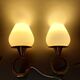 Pair of sconces in gilded brass and Art Deco lacquered