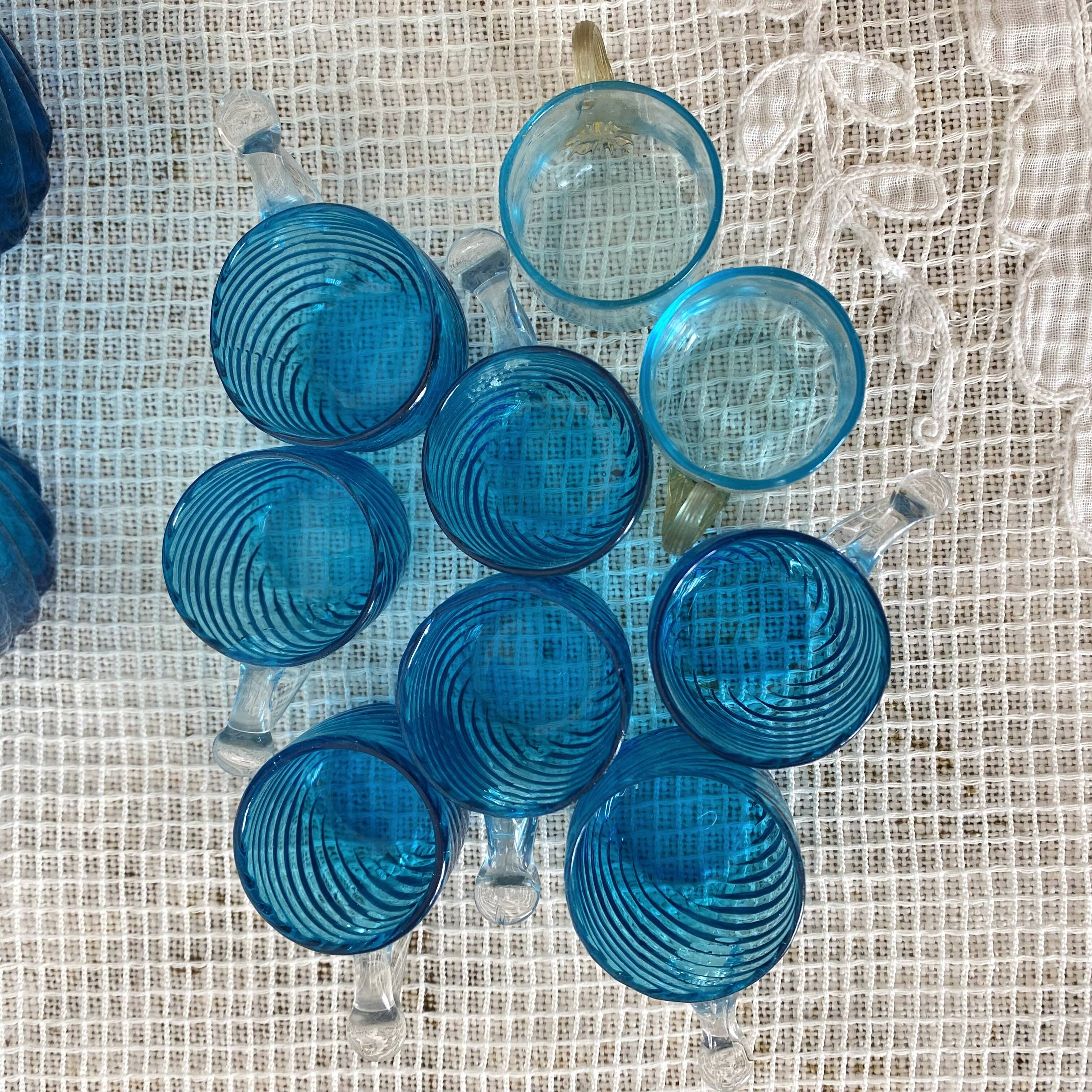 Antique Legras liquor cabinet, decanters and glasses, lion's paw stand