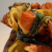 Trompe-l'Œil Ceramic Vase in the Shape of a Knotted Bag with Floral Decoration. Work